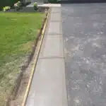 Concrete Walk by Driveway